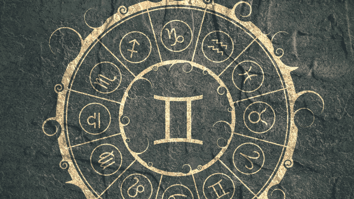 Símbolo do signo de Gêmeos no centro de uma roda com todos os signos do Zodíaco. 