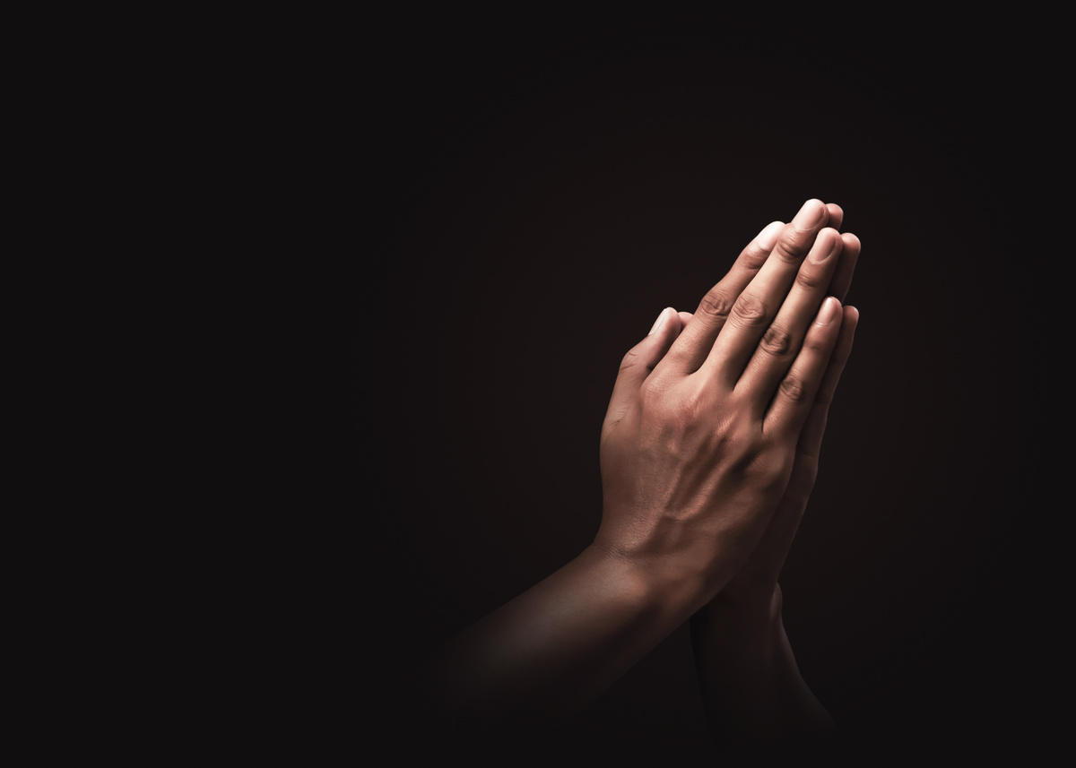 Mãos em sinal de oração