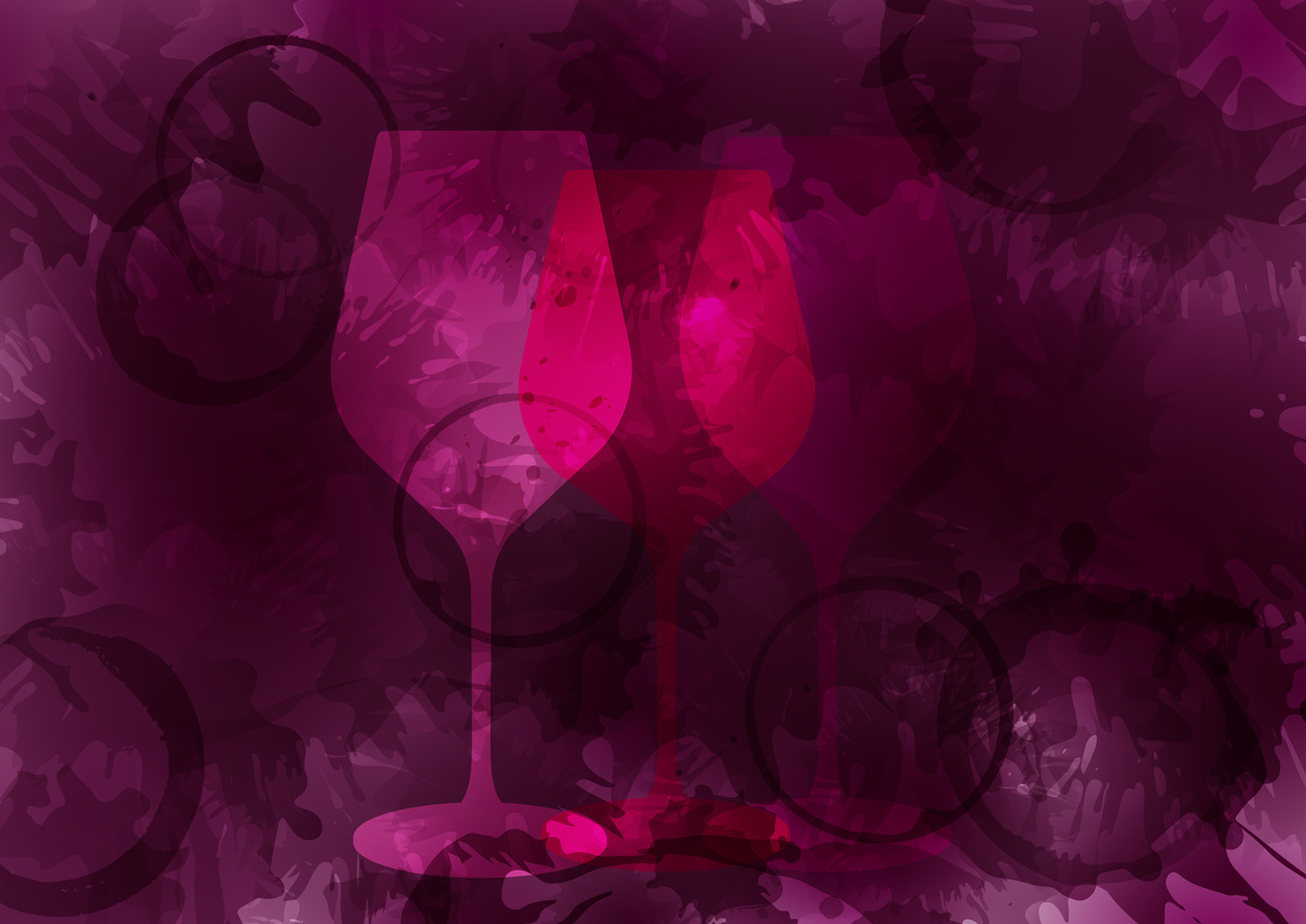 Taças de vinho em um fundo vinho.