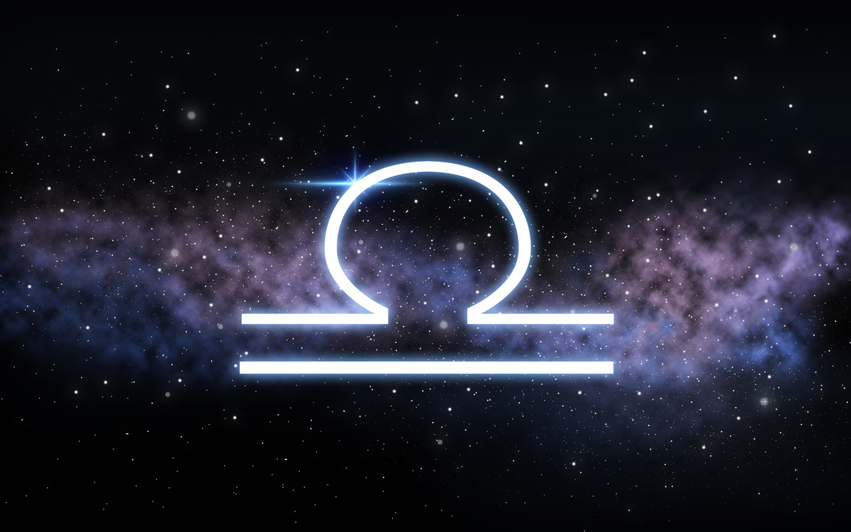 Ilustração de símbolo de Libra em céu estrelado e noturno.