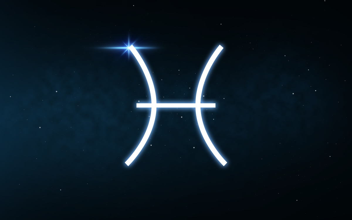 Símbolo do signo de Peixes feito em traço branco, em fundo de céu escuro e estrelado.