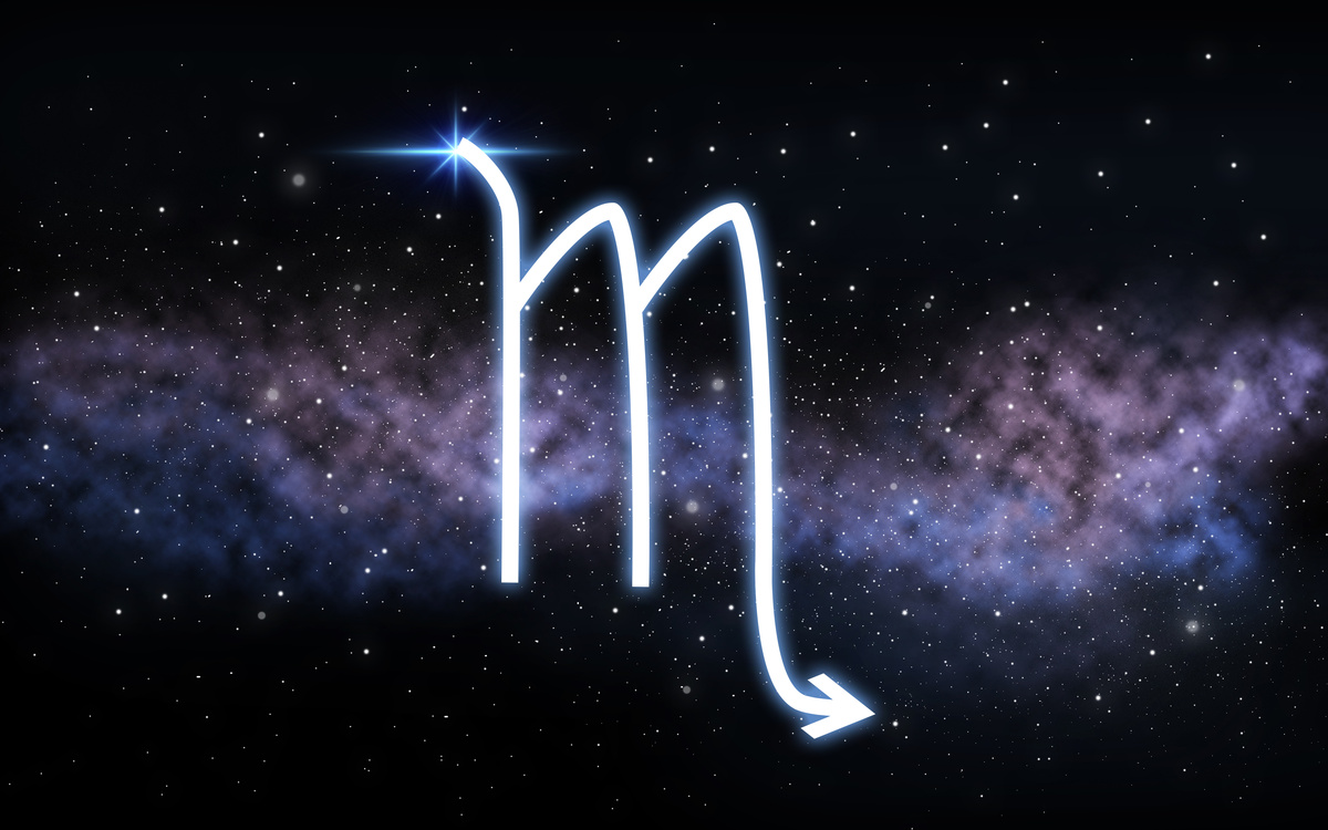 Símbolo do signo de Escorpião em um céu estrelado.
