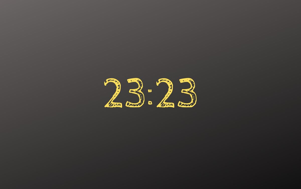 23:23 amarelo em fundo preto.