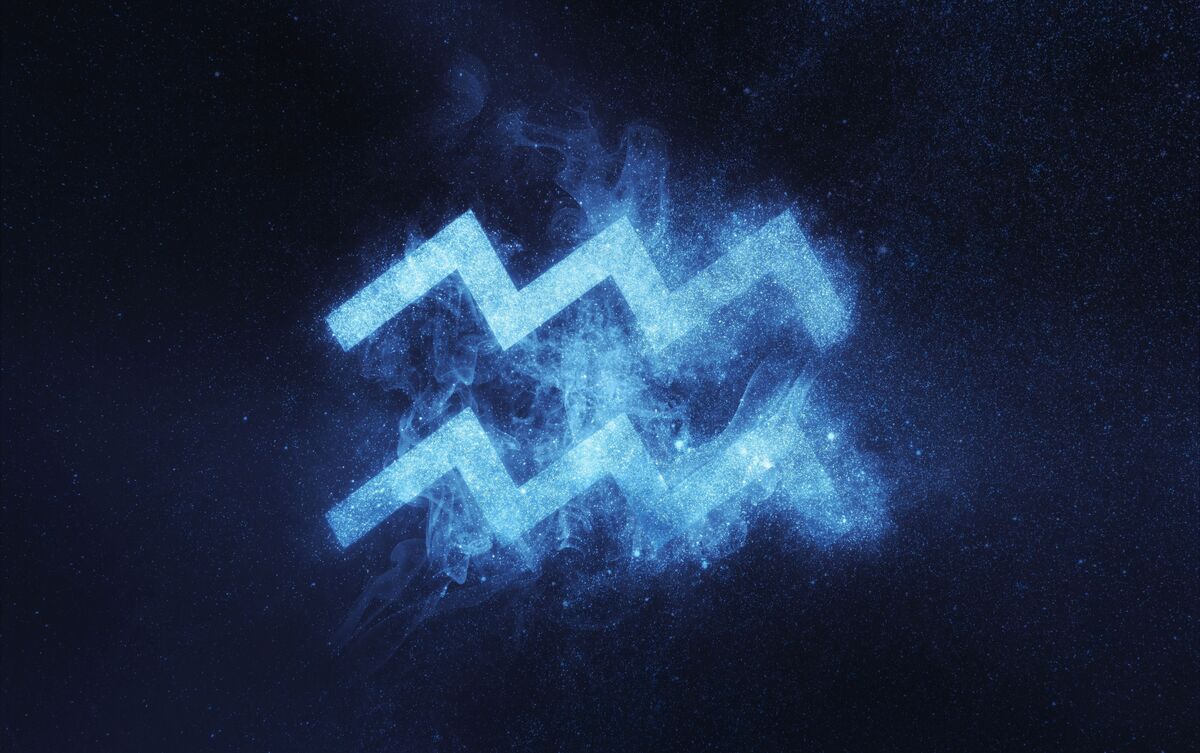 Símbolo do signo Aquário em azul sobre fundo escuro.