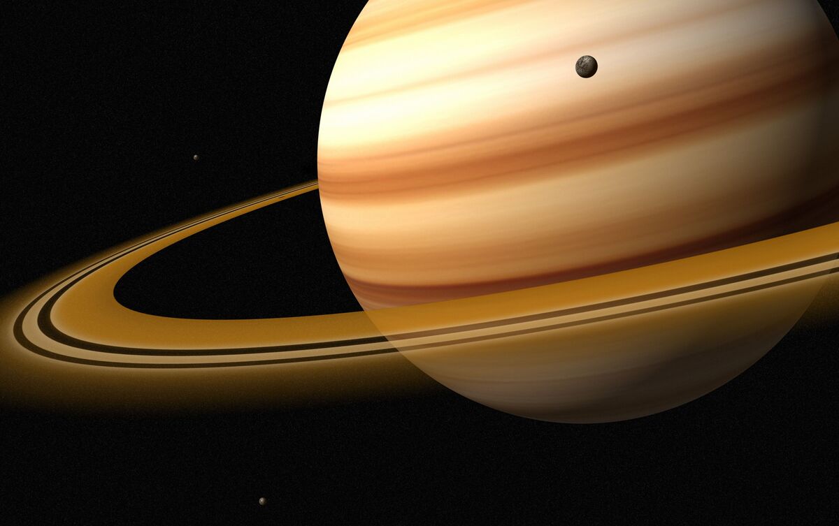 Saturno com lua em volta.
