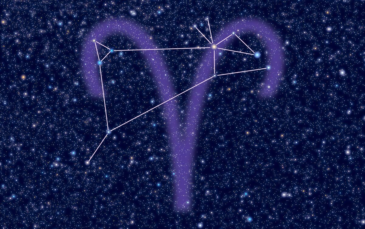 Símbolo de constelação do signo de Áries em fundo estrelado.